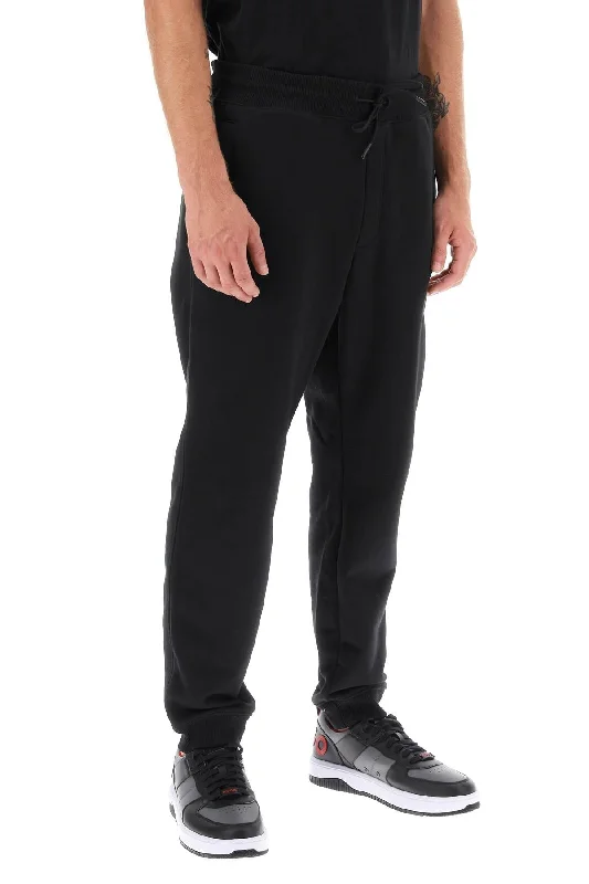 Classic khaki pants for timeless wardrobe staples -drokko double logo sweatpants