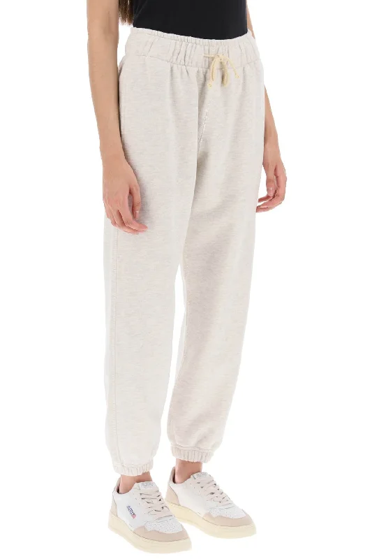 High-waisted skinny pants for trendy women’s fashion -melange sweatpants with logo patch