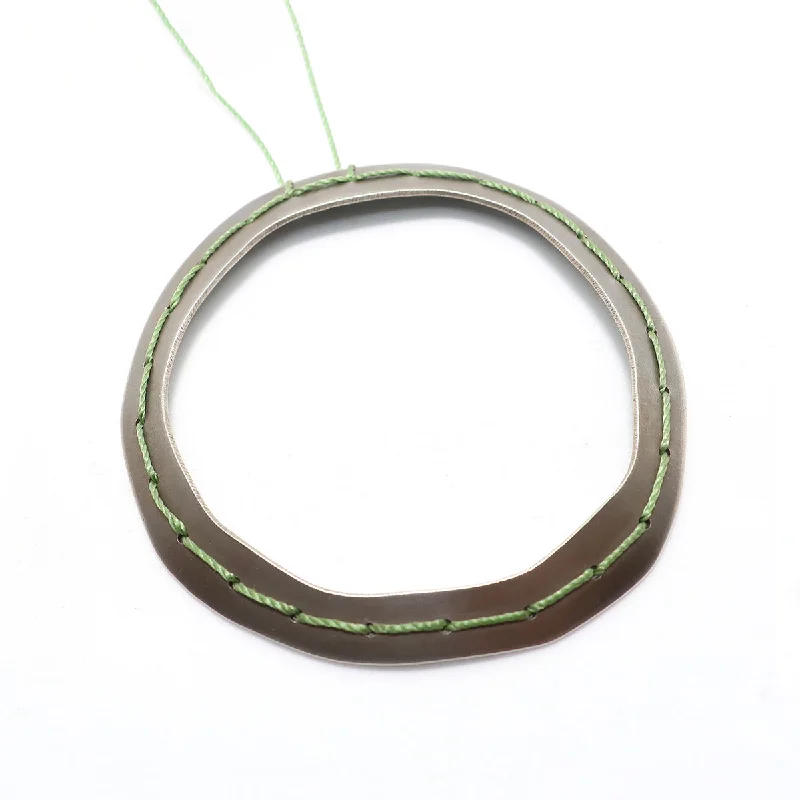 Best necklaces and pendants with silver chains for a sleek, timeless look-Green Stitched Doughnut Necklace