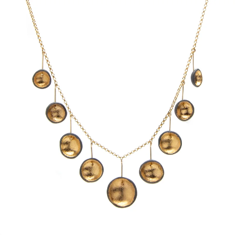 Stunning necklaces and pendants with ruby and diamond combinations for a luxurious effect-Gold and Black Porcelain Necklace