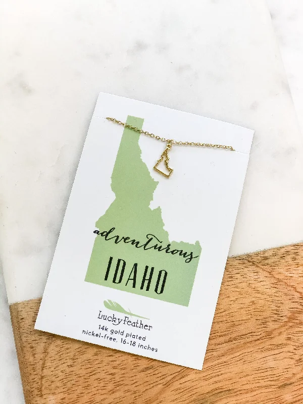 Personalized necklaces and pendants with name engravings for a custom touch-Petite State Outline Pendant Necklaces by Lucky Feather - Idaho